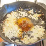 Add the spices | https://theyumyumclub.com/2019/05/27/aromatic-tandoori-chicken-tikka-masala/