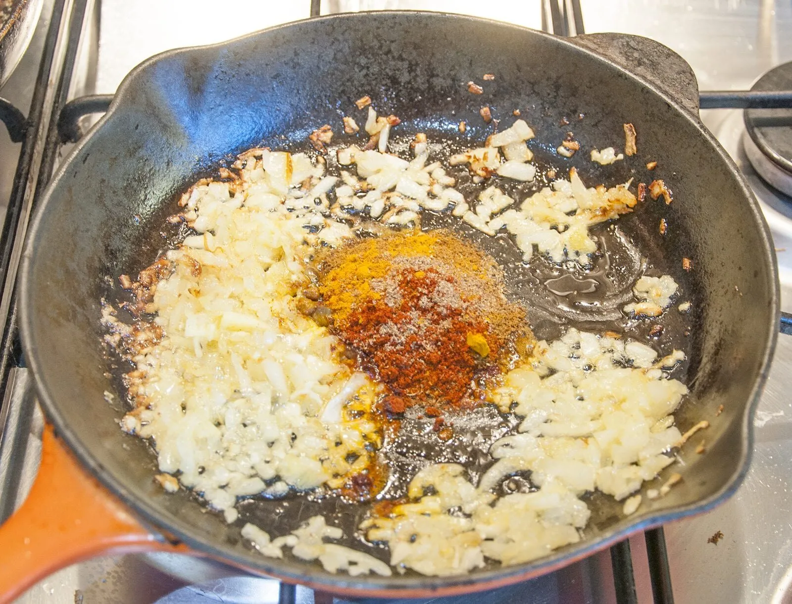 Add the spices | https://theyumyumclub.com/2019/05/27/aromatic-tandoori-chicken-tikka-masala/