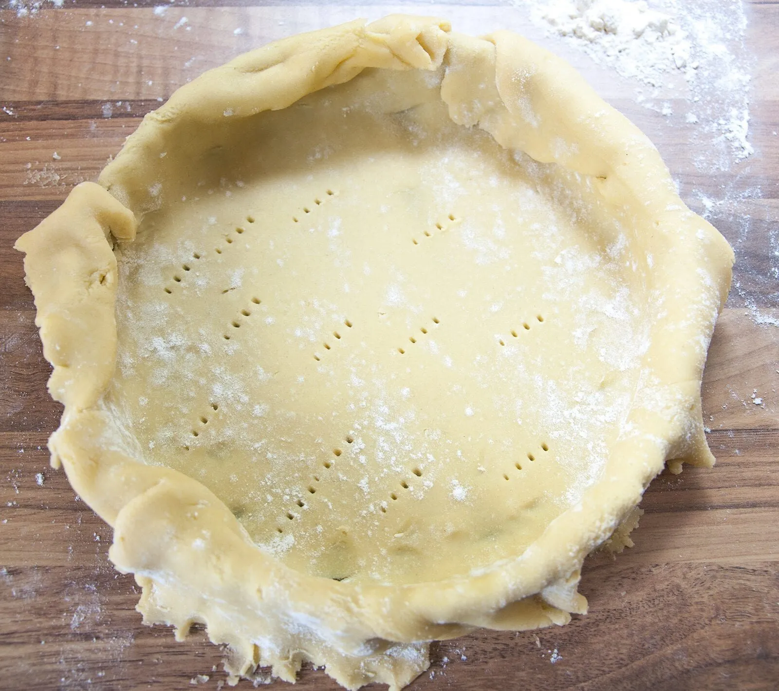 School Pudding Gypsy Tart. Dock the pastry | https://theyumyumclub.com/2019/05/23/school-pudding-gypsy-tart/