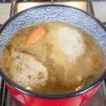 Pork loin in brandy and cream. Add the stock and carrots | https://theyumyumclub.com/2019/05/01/pork-loin-brandy-cream/