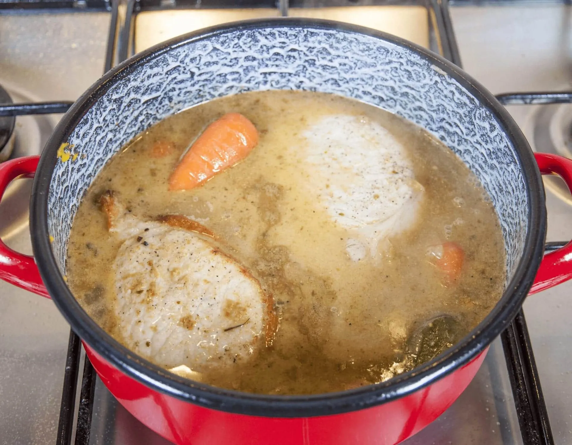 Pork loin in brandy and cream. Add the stock and carrots | https://theyumyumclub.com/2019/05/01/pork-loin-brandy-cream/