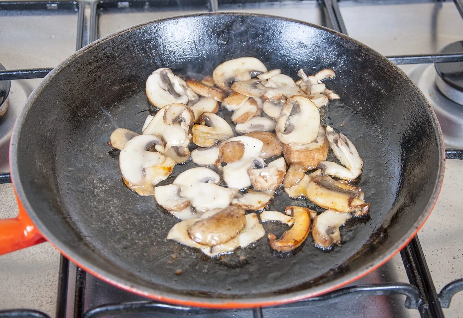 Pork loin in brandy and cream. Brown the mushrooms | https://theyumyumclub.com/2019/05/01/pork-loin-brandy-cream/