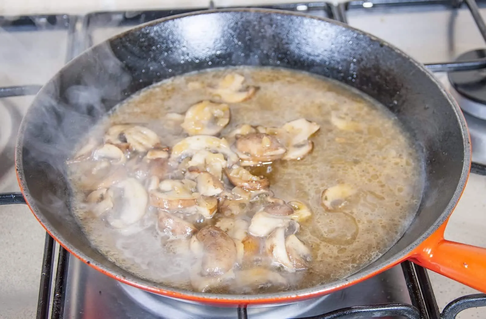 Pork loin in brandy and cream. Add the stock and reduce | https://theyumyumclub.com/2019/05/01/pork-loin-brandy-cream/