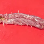Streaky & apple pork tenderloin. Roll the pork tenderloin | https://theyumyumclub.com/2019/05/19/streaky-apple-pork-tenderloin/