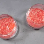 Fluffy and creamy strawberry mousse. Spoon the strawberry mixture into glasses. | https://theyumyumclub.com/2019/05/10/fluffy-creamy-strawberry-mousse/