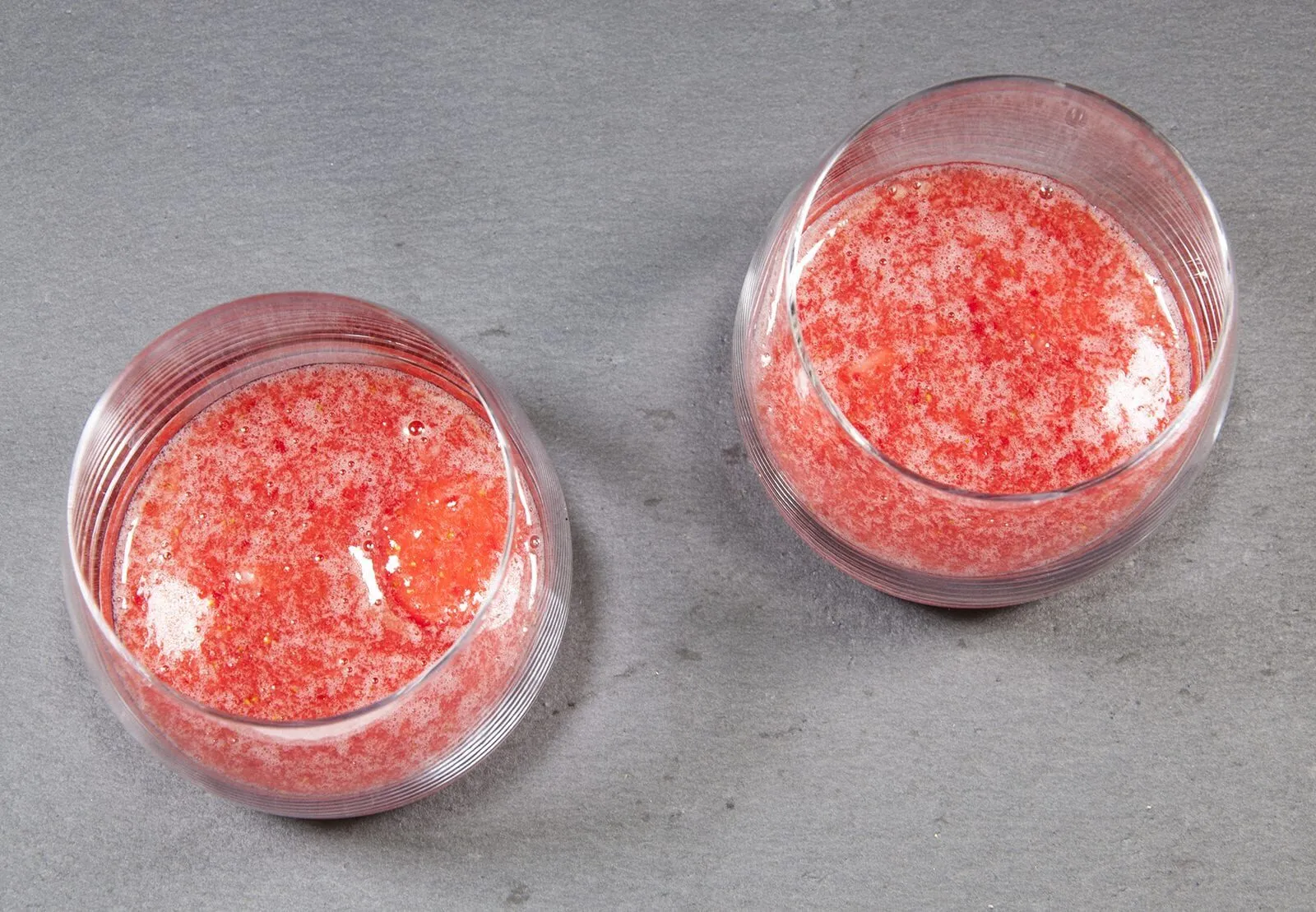 Fluffy and creamy strawberry mousse. Spoon the strawberry mixture into glasses. | https://theyumyumclub.com/2019/05/10/fluffy-creamy-strawberry-mousse/