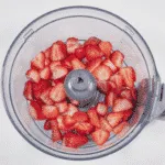Fluffy and creamy strawberry mousse. Add the strawberries to the blender. | https://theyumyumclub.com/2019/05/10/fluffy-creamy-strawberry-mousse/