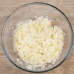 Cheddar topped shepherd's pie. Mash the potatoes | https://theyumyumclub.com/2019/05/16/cheddar-topped-shepherds-pie/