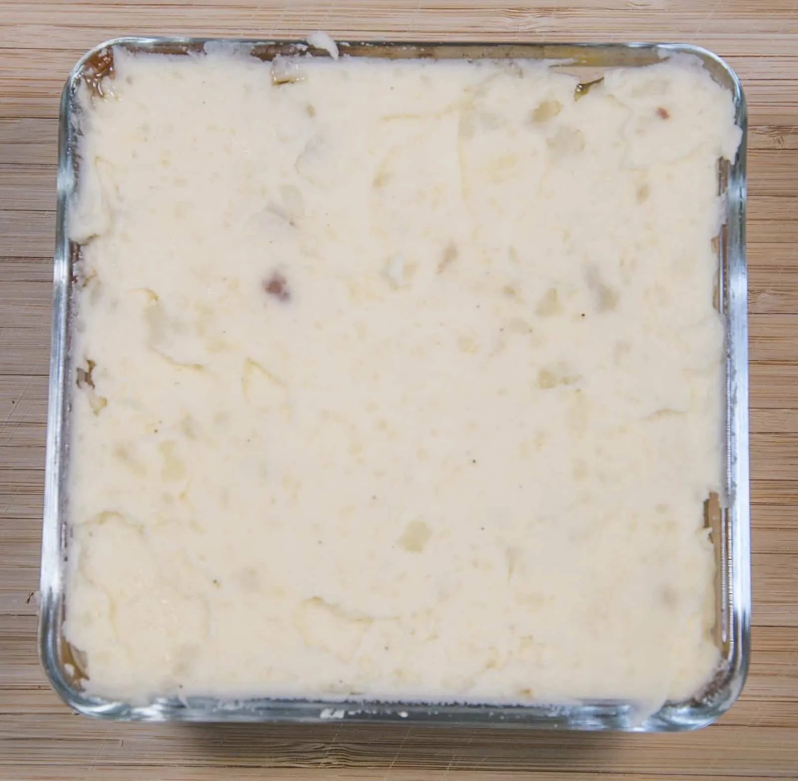 Cheddar topped shepherd's pie. Smooth the potato | https://theyumyumclub.com/2019/05/16/cheddar-topped-shepherds-pie/