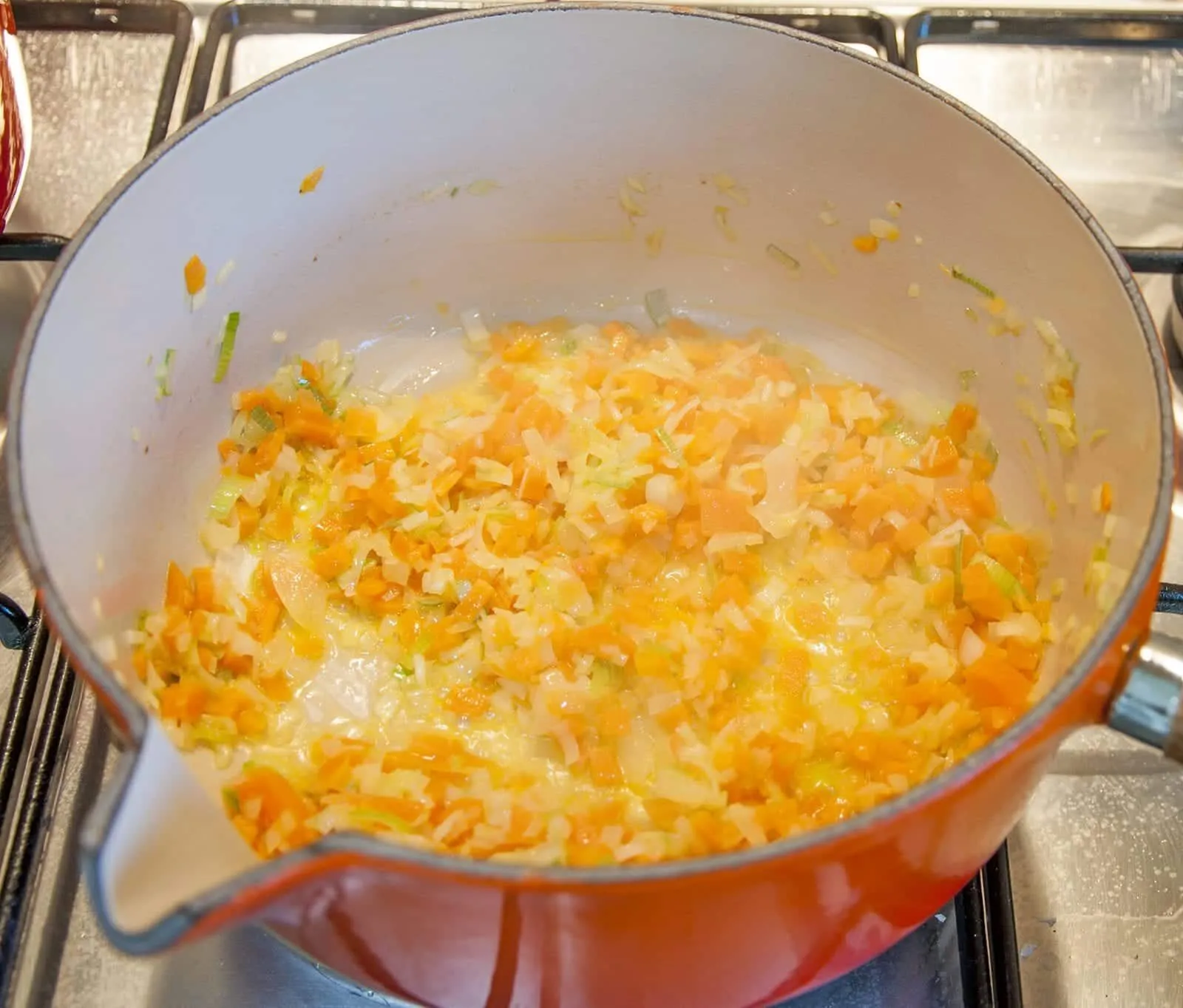 Cheddar topped shepherd's pie. Soften the carrots and leeks