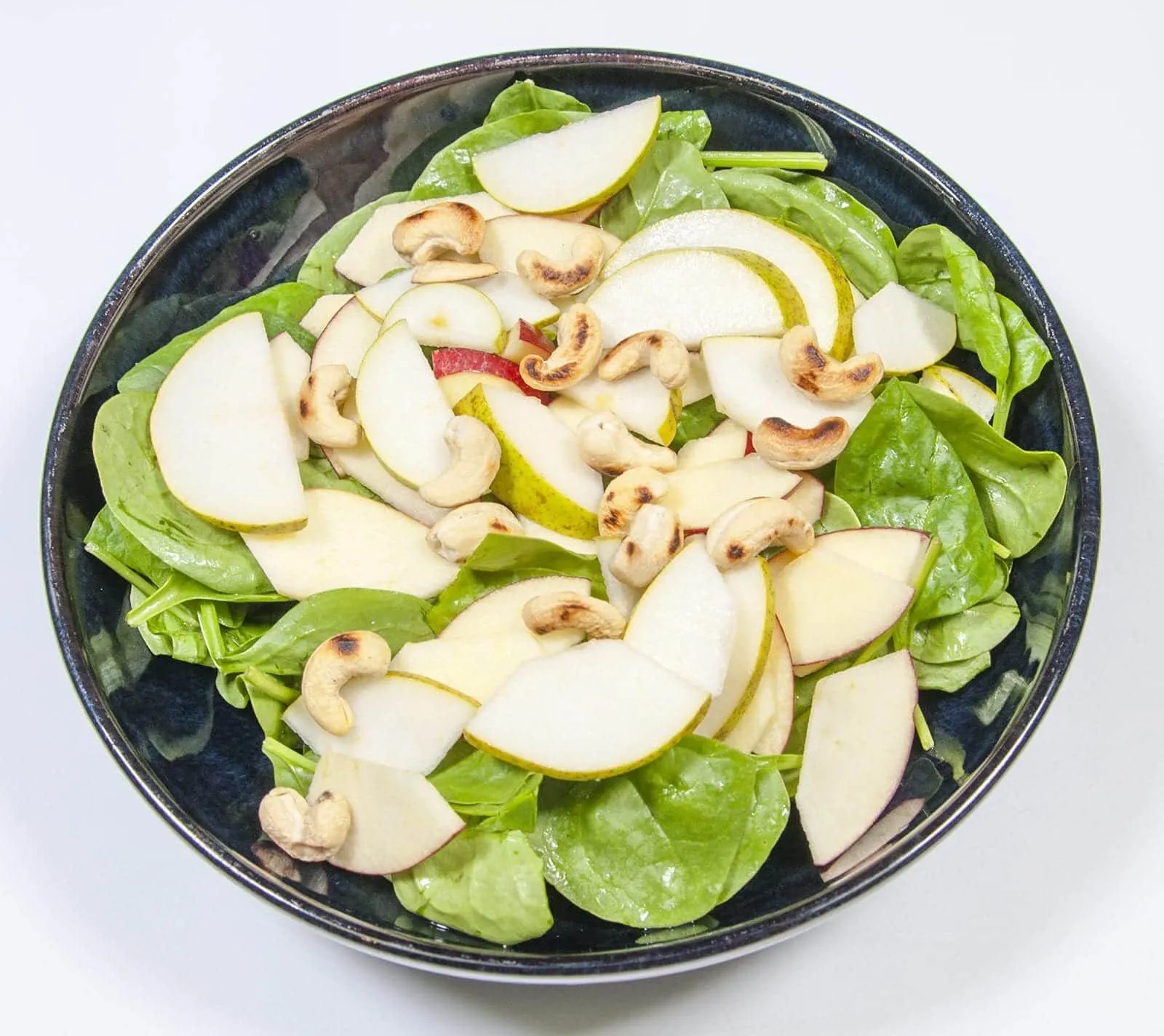 Add the nuts | https://theyumyumclub.com/2019/06/10/cashew-cranberry-comte-fruit-salad/