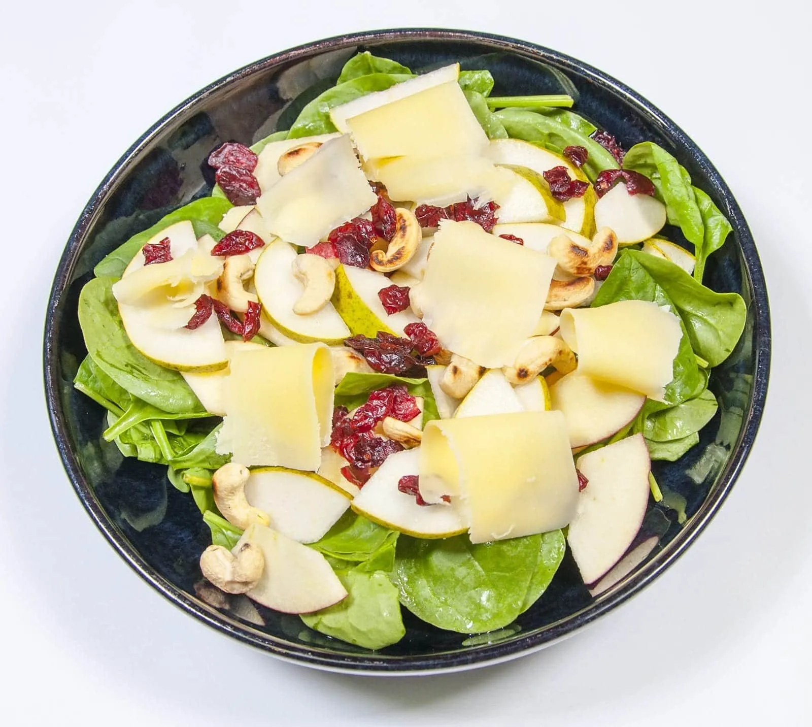 Add the cheese | https://theyumyumclub.com/2019/06/10/cashew-cranberry-comte-fruit-salad/