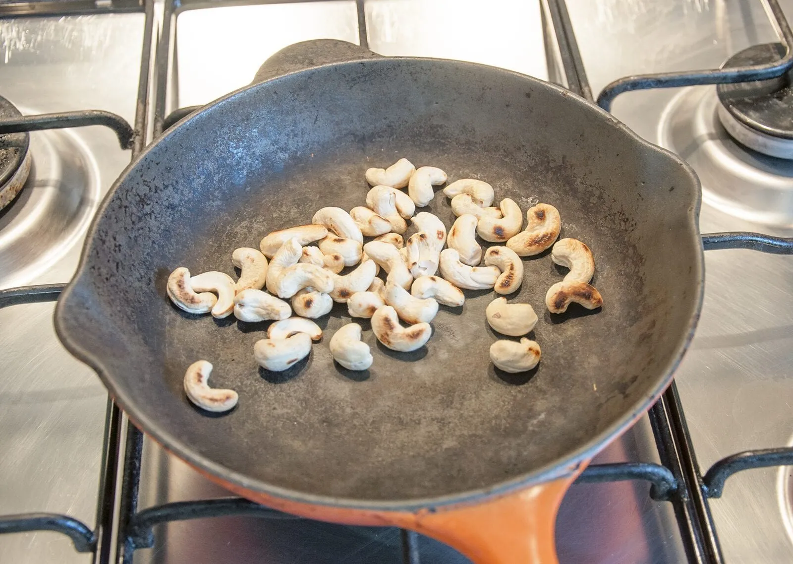 Dry roast the cashews | https://theyumyumclub.com/2019/06/10/cashew-cranberry-comte-fruit-salad/
