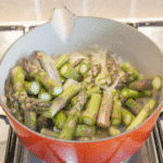Add the asparagus | https://theyumyumclub.com/2019/06/15/asparagus-soup-lemon-parmesan/