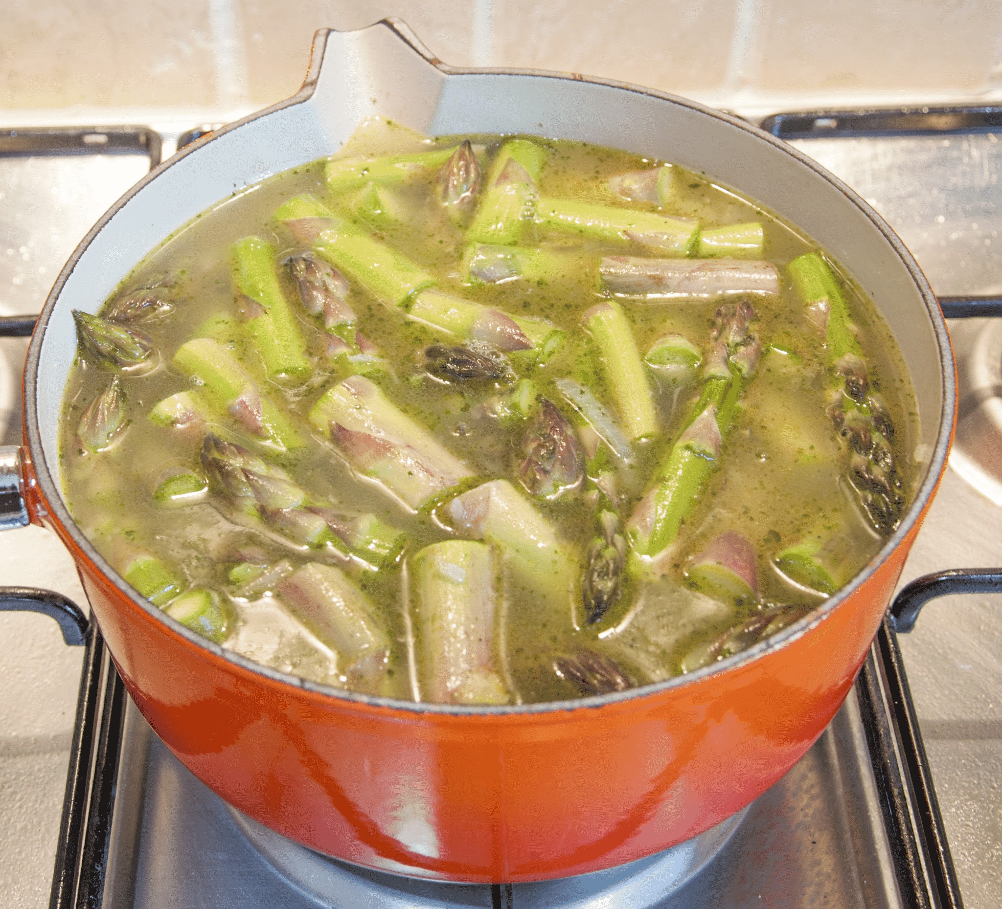 Add the stock | https://theyumyumclub.com/2019/06/15/asparagus-soup-lemon-parmesan/