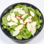 Add the apple | https://theyumyumclub.com/2019/06/10/cashew-cranberry-comte-fruit-salad/