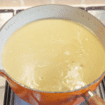 Blitz to a smooth soup | https://theyumyumclub.com/2019/06/15/asparagus-soup-lemon-parmesan/