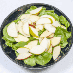 Add the pears | https://theyumyumclub.com/2019/06/10/cashew-cranberry-comte-fruit-salad/