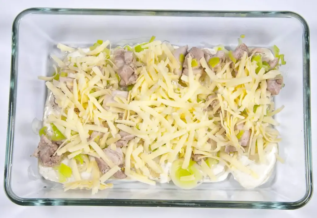 Chicken and Leek Dauphinoise. Add the cheese | https://theyumyumclub.com/2019/06/03/chicken-leek-dauphinoise/