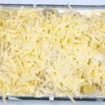 Chicken and Leek Dauphinoise. Pour over the cream and garlic mixture | https://theyumyumclub.com/2019/06/03/chicken-leek-dauphinoise/
