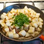 Add the parsley | https://theyumyumclub.com/2019/06/24/bavarian-potato-salad-bacon/