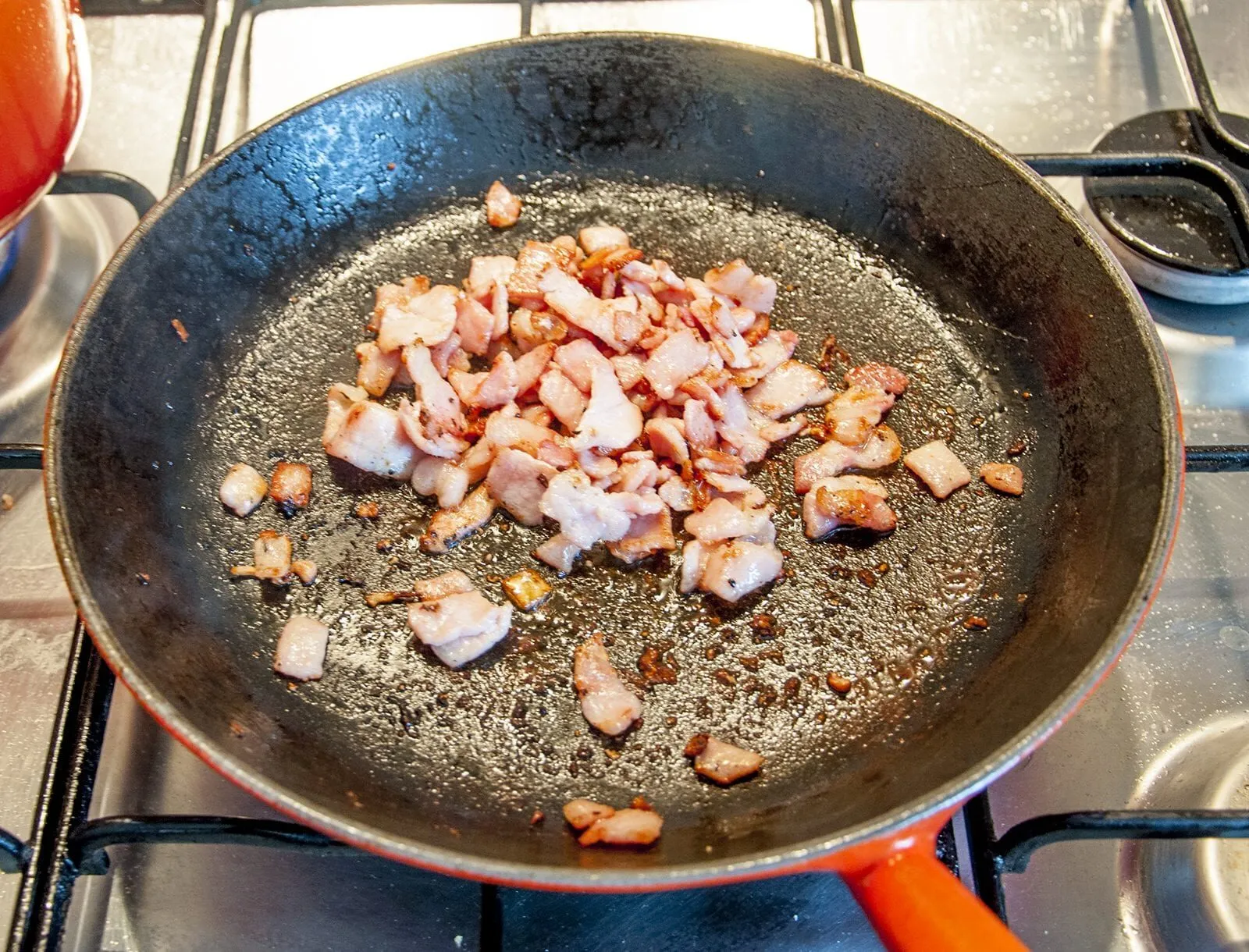 Brown off the bacon | https://theyumyumclub.com/2019/06/24/bavarian-potato-salad-bacon/