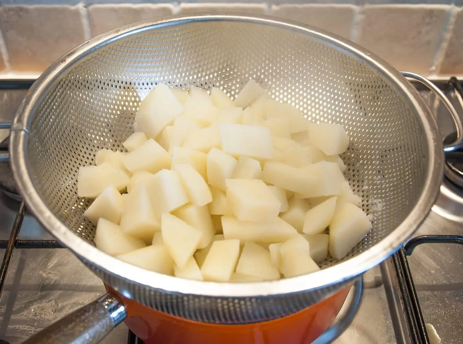 Cook the potatoes | https://theyumyumclub.com/2019/06/24/bavarian-potato-salad-bacon/