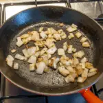 Brown the onions | https://theyumyumclub.com/2019/06/24/bavarian-potato-salad-bacon/
