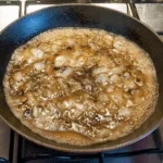 Add the white wine vinegar | https://theyumyumclub.com/2019/06/24/bavarian-potato-salad-bacon/