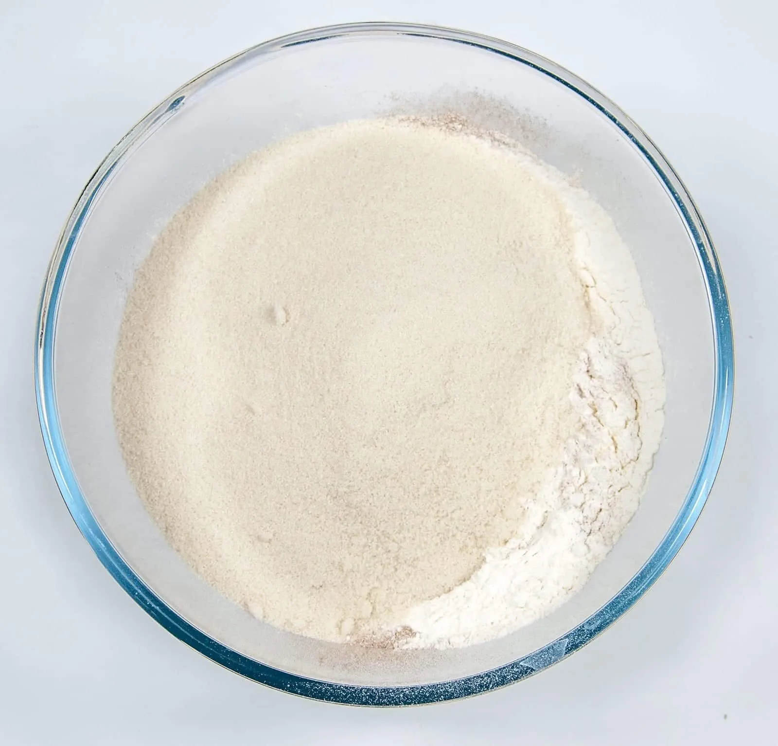 Add the sugar. Humble Hummingbird Cake With Sweet Pecan Dust | https://theyumyumclub.com/2019/06/05/humble-hummingbird-cake-sweet-pecan-dust/