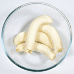 Add the bananas in a bowl. Humble Hummingbird Cake With Sweet Pecan Dust | https://theyumyumclub.com/2019/06/05/humble-hummingbird-cake-sweet-pecan-dust/