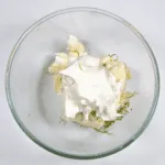 Add the cream cheese and lime. Humble Hummingbird Cake With Sweet Pecan Dust | https://theyumyumclub.com/2019/06/05/humble-hummingbird-cake-sweet-pecan-dust/