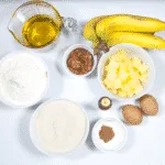 Gather the ingredients together. Humble Hummingbird Cake With Sweet Pecan Dust | https://theyumyumclub.com/2019/06/05/humble-hummingbird-cake-sweet-pecan-dust/