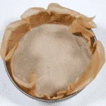 Line both cakes tins. Humble Hummingbird Cake With Sweet Pecan Dust | https://theyumyumclub.com/2019/06/05/humble-hummingbird-cake-sweet-pecan-dust/