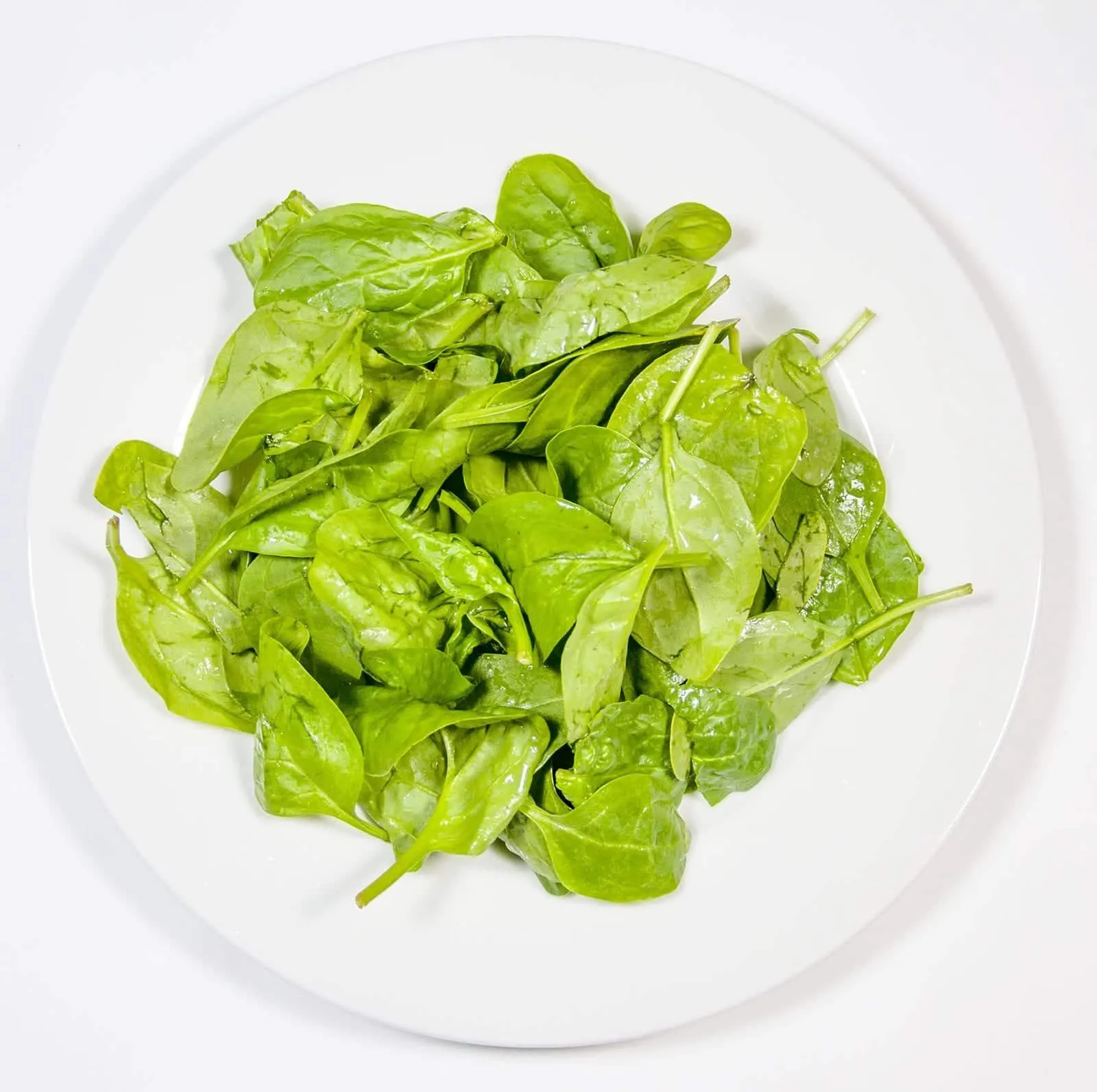 Lay out the spinach | https://theyumyumclub.com/2019/06/18/moroccan-chickpea-salad/