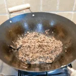 Pan-fry the ground beef | https://theyumyumclub.com/2019/07/22/ho-chi-minh-surf-turf/
