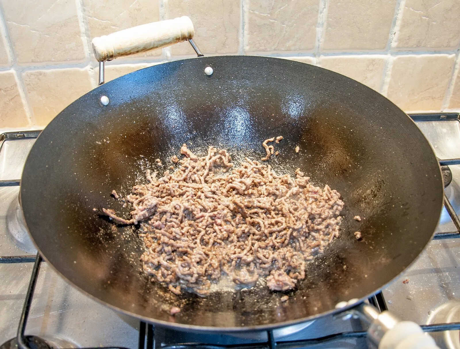 Pan-fry the ground beef | https://theyumyumclub.com/2019/07/22/ho-chi-minh-surf-turf/