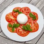 Burrata & Bull Tomato Salad | https://theyumyumclub.com/2019/07/25/burrata-bull-tomato-salad/