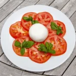 Burrata & Bull Tomato Salad | https://theyumyumclub.com/2019/07/25/burrata-bull-tomato-salad/