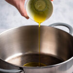 Heat olive oil in a deep pot.