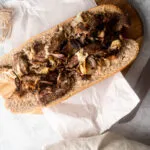 fill the baguette with the meat and cheese mixture.
