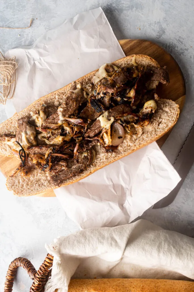 fill the baguette with the meat and cheese mixture.