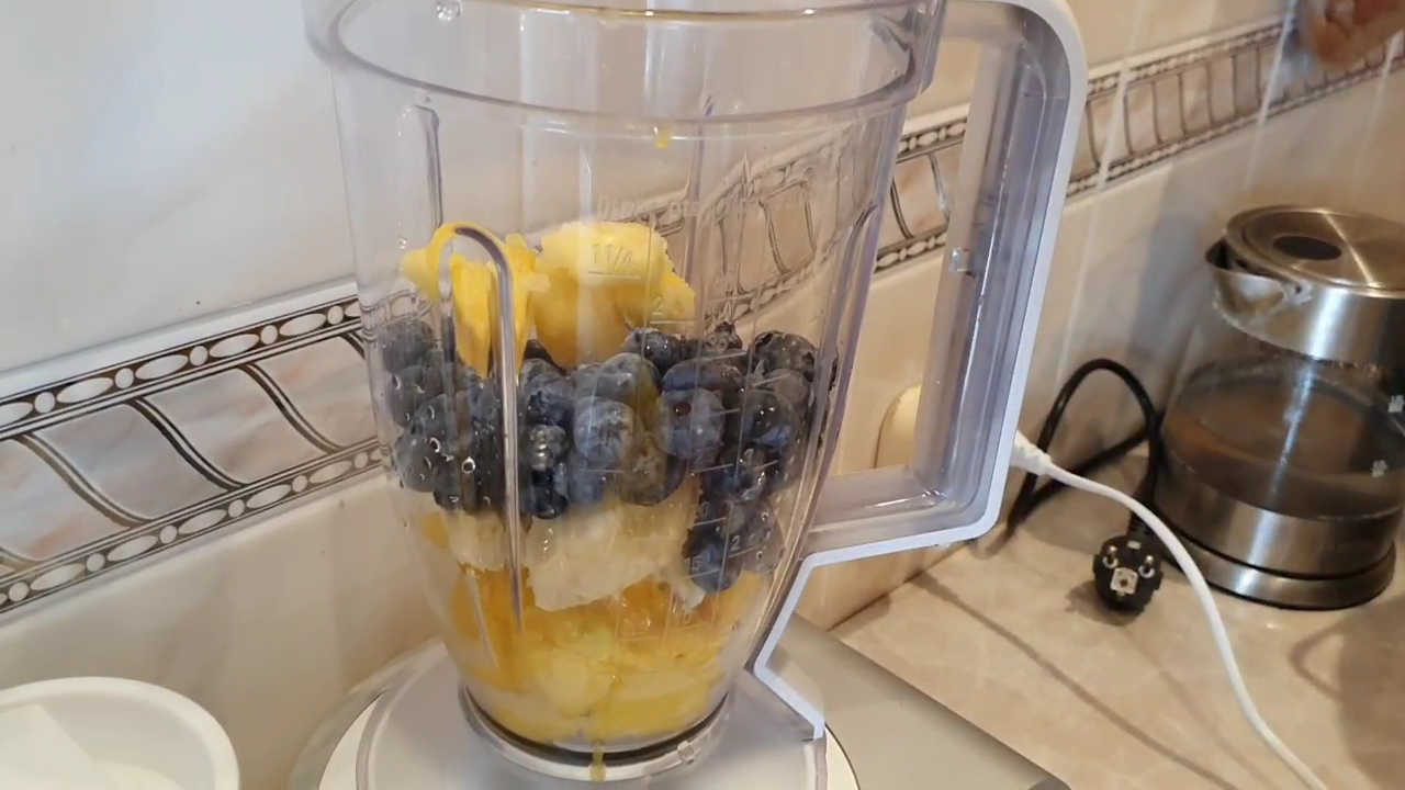 Banana, Mango and Blueberry Smoothie - all ingredients in the blender